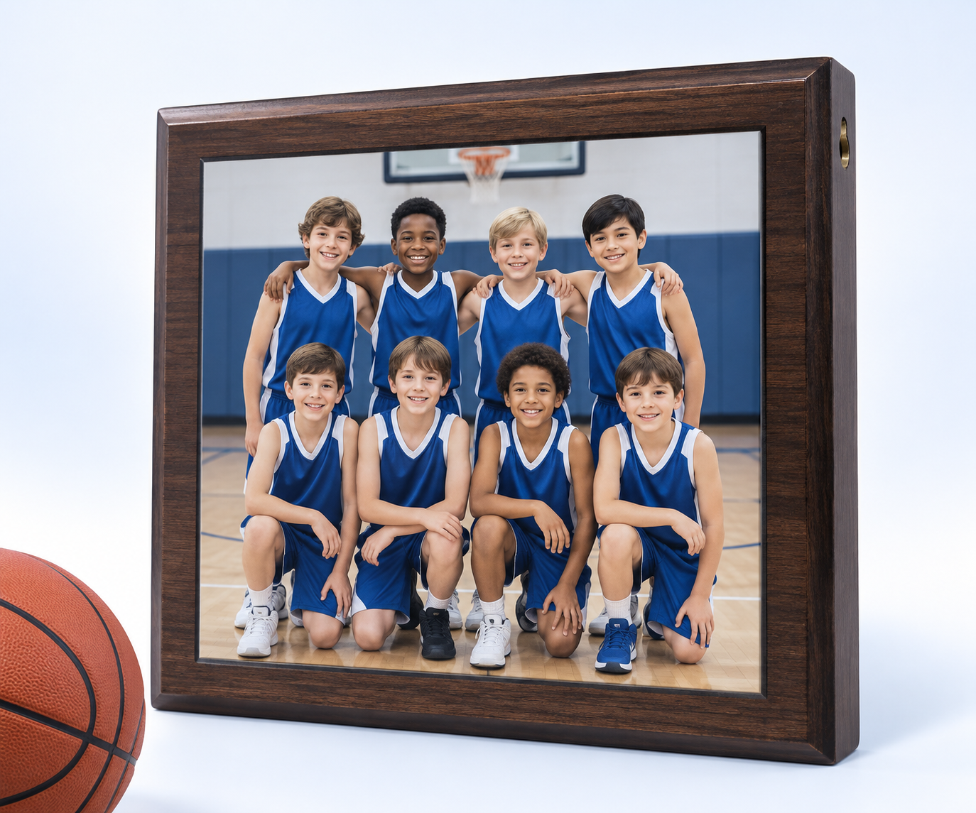Wood plaque with a basketball team photo